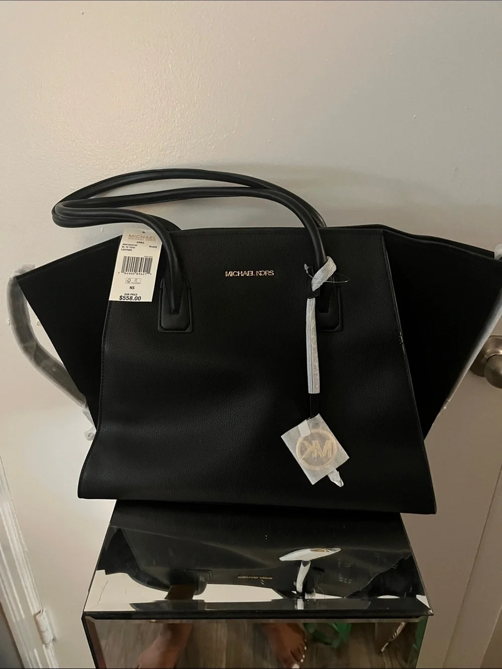 Michael Kors Black Leather Wing-Style Tote with Gold Logo Accent